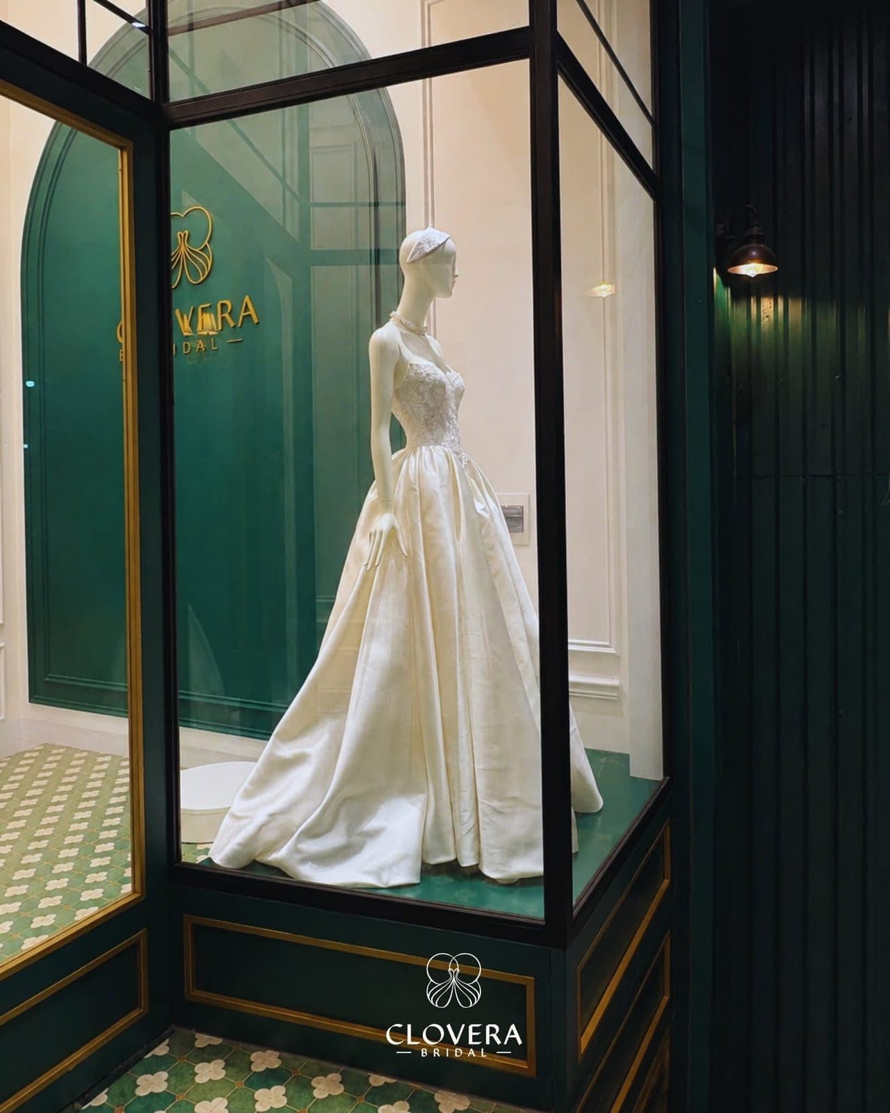 A Clovera gown in the showroom display case